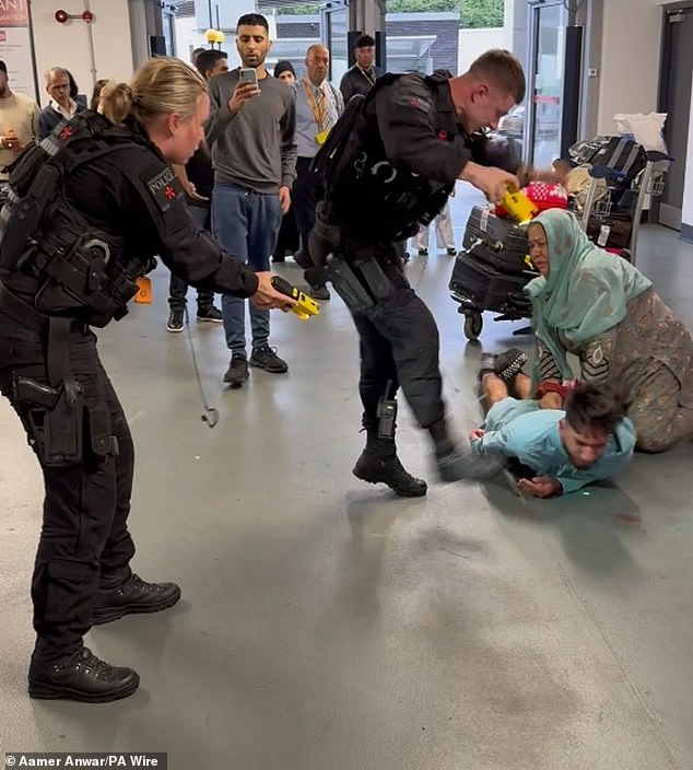 Footage of PC Zachary Marsden kicking Amaaz in the head (pictured) went viral online and sparked accusations of police brutality