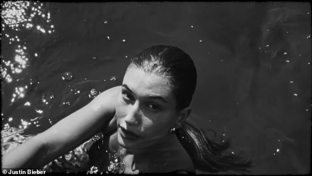 Hailey splashes about in the water