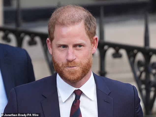 Prince Harry last night walked away from his African youth charity following a damning report into an explosive race row