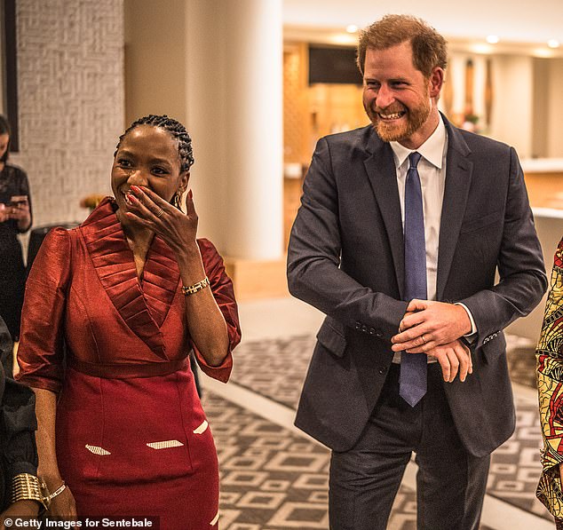 The Charity Commission has criticised both sides for the 'damaging internal dispute'. Pictured: Dr Chandauka with Prince Harry last October