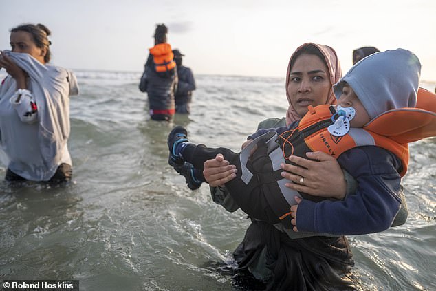 Three migrant dinghies left from just one French beach this morning. The groups were mainly men, but also included women, with one carrying a little boy sucking on a blue dummy