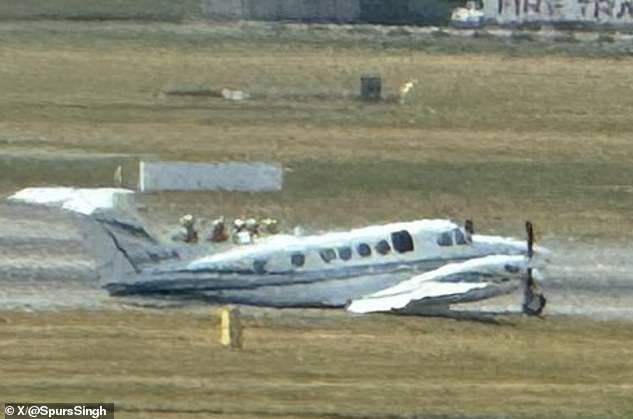 The twin-engine Beech B200 Super King Air plane on the runway at Birmingham Airport today