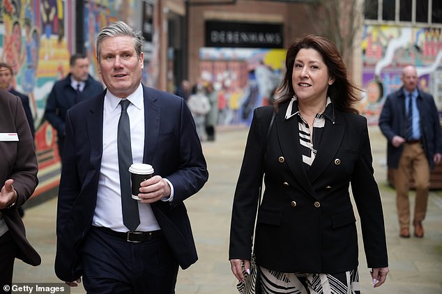 Labour MP for Barrow and Furness Michelle Scrogham, pictured with Sir Keir Starmer, attended the counter-protests, saying: 'I am here because there's absolutely no place for racism in Cumbria'