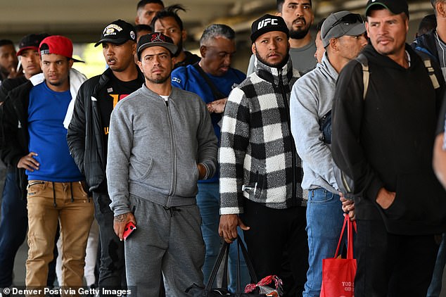 Between January 2021 and October 2023 – during Biden’s term – US Customs and Border Protection (CBP) recorded encounters with more than 380,000 Venezuelan nationals coming over the US-Mexico border (Pictured: Venezuelan migrants wait in a line at a migrant processing center in Denver in May 2023)