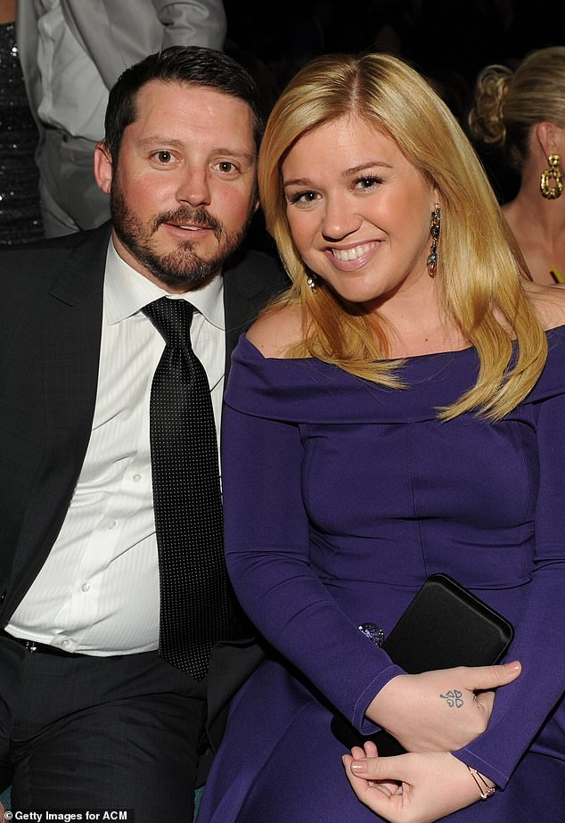Clarkson and Blackstock (L) married in 2013 and split in 2020. Their divorce was finalized two years later, but their legal wrangling over financial matters related to his time as her manager continued; pictured in 2013 in Las Vegas