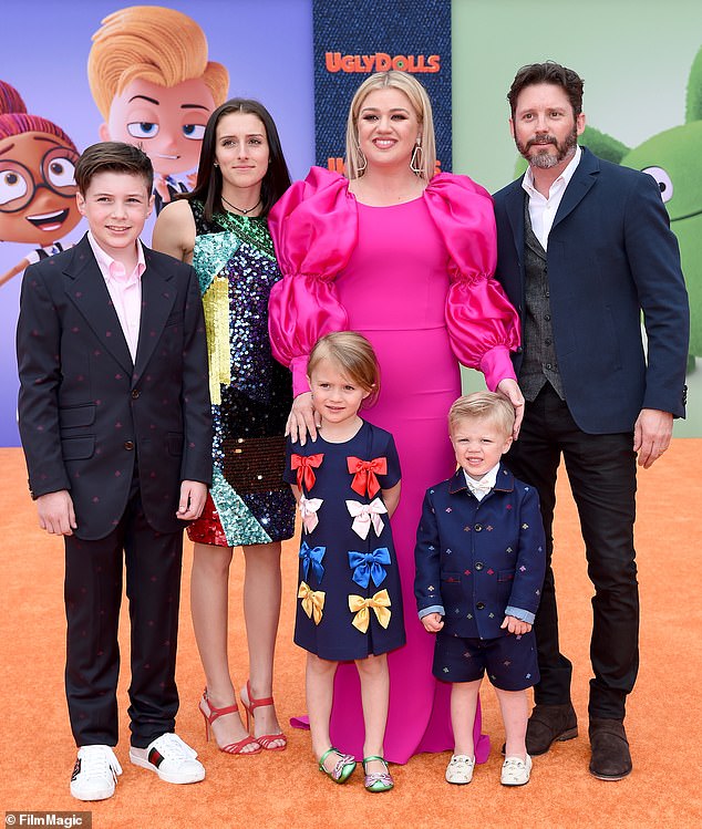 The talent manager is also survived by daughter Savannah, 23, and son Seth with ex-wife Melissa Ashworth; the blended family pictured in 2019