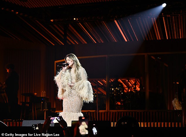 Clarkson didn’t share information on whether ticket holders for her postponed August residency dates would be able to get refunds, and she didn’t reveal rescheduled dates; pictured July 11 in Las Vegas as part of her Studio Session residency