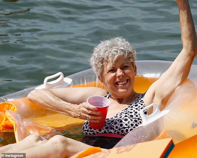 Jane seen flashing a cheerful smile as she enjoyed a dip in the water during a vacation