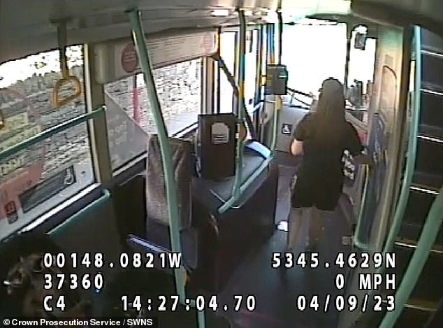 Video shows Ms Marriott, dressed in shorts, t-shirt and a baseball cap and carrying a canned drink, walking along the interior of the bus as it slows to a halt