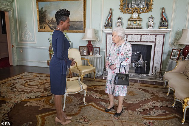 Queen Elizabeth II receives the High Commissioner for Grenada, Lakisha Grant, at Buckingham Palace in October 2019