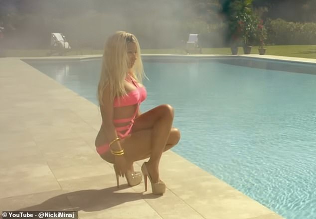 The so-called 'Stiletto Challenge' has taken social media by storm, with thousands of users attempting to copy a scene from a 2013 music video in which Minaj poses beside a swimming pool, crouched in heels with one leg crossed over the other