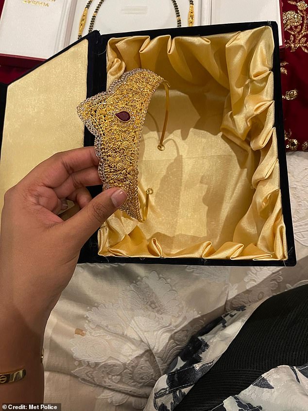 The home owners remained in the property throughout the extensive burglary (pictured: a golden tiara stolen in the robbery)