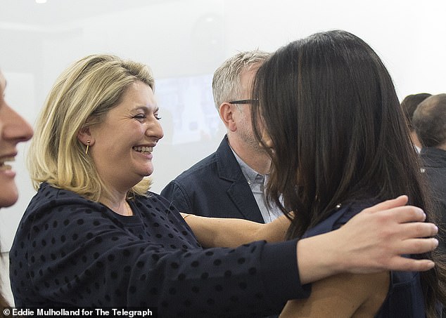 Bryony meeting Meghan for the first time at the event, at which Bryony was chairing a panel