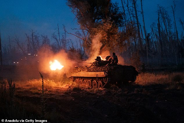 1st brigade of National Guard 'Bureviy' fire a tank as they carry out a mission in a BMP-2 to shoot at Russian positions in Serebryanskyy forest, in Luhansk, Ukraine on June 19, 2024