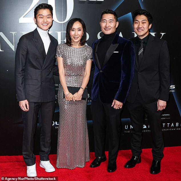 Daniel is also father to 22–year–old son Jackson (left) as he shares both children with wife of over 30 years Mia Kim; the family are seen in LA back in December 2022