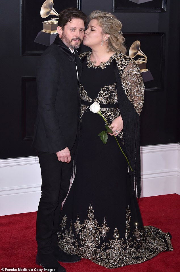 Clarkson's relationship with Blackstock began in 2012, and the two tied the knot the following year. They had both a romantic and professional relationship at first, as her husband also served as her manager - pictured 2018