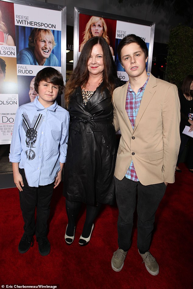 LAPD's Pacific Division spokesperson informed the outlet that 'they would not be releasing a mugshot' for Norfleet (R, pictured in 2010), whose mother is the 88-year-old movie star's daughter Jennifer Nicholson (M)