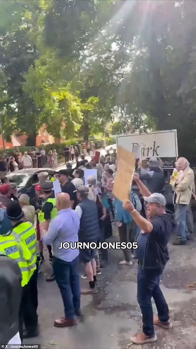Around 150 people took to the market town's streets last month (pictured) to protest the move after it was announced by the Home Office