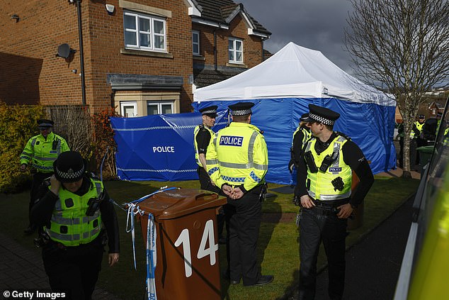 Ms Sturgeon and Mr Murrell were arrested as part of Police Scotland's Operation Branchform probe into the SNP's finances (police pictured outside their home, Aprl, 2023)