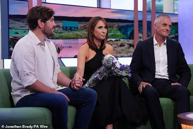Alex Jones was left visibly emotional on Friday night as her husband Charlie Thomson made a surprise appearance on The One Show (L-R Alex's husband Charlie, Alex, and BBC director general Tim Davie)