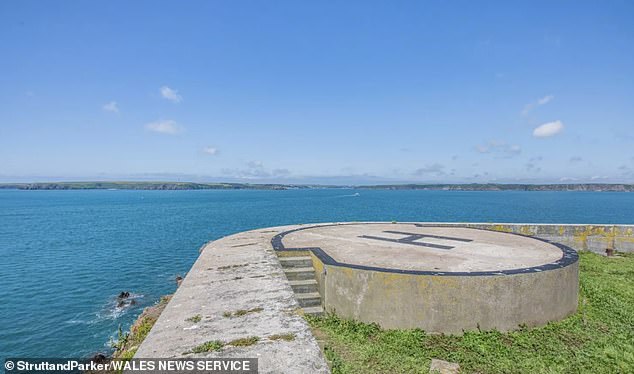The fortress island offers sweeping coastal views and even comes with its own helipad