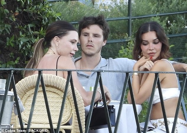The couple are currently enjoying a yacht holiday with children Romeo, Cruz and Harper, while their eldest son Brooklyn and his wife Nicola Peltz miss out on the fun
