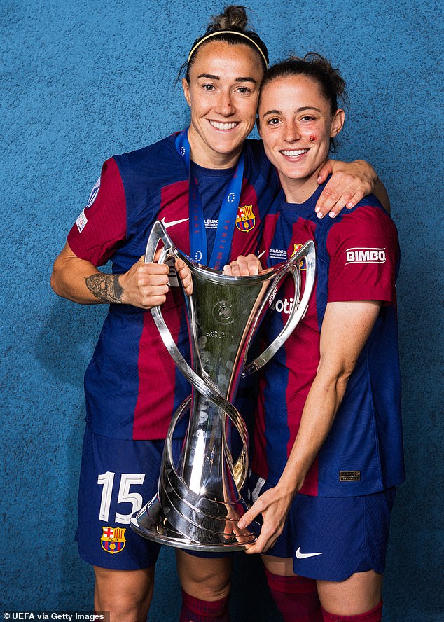 Wearing matching string brown bikinis, Chelsea right-back Lucy (left), 33, and Barcelona defender Ona (right), 26, tanned on a motorboat. Pictured: The pair, of FC Barcelona, pose with the UEFA Women's Champions League trophy after victory in 2023/24