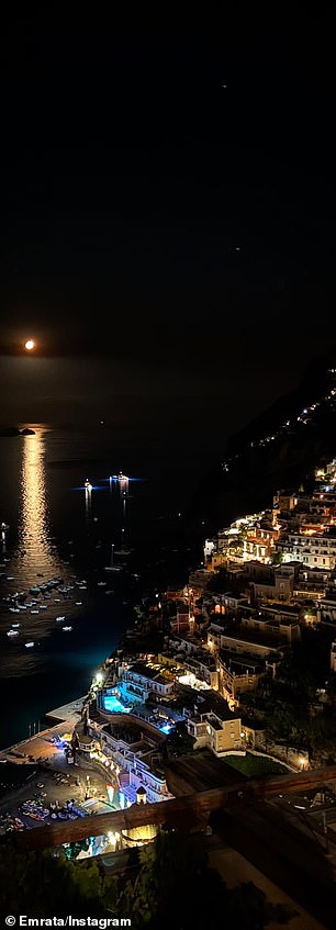She also posted a photo of the Positano shore at night with the moon on the water and the lights outlining the city