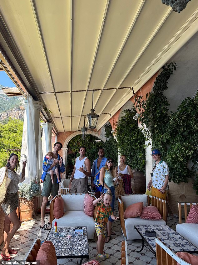The model also included a photo of Positano at night, lit up by lights, as well as a candid portrait of her friends and their kids