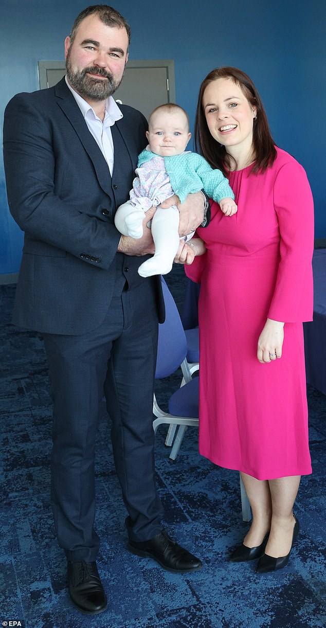 Kate (pictured with husband Alasdair MacLennan and daughter Naomi) will leave politics after next years elections