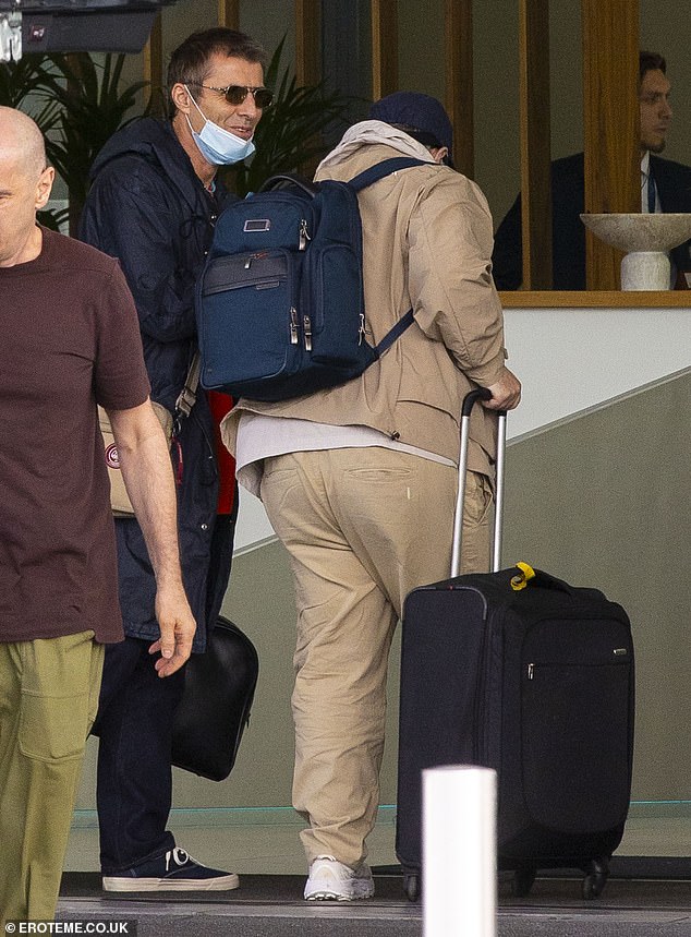 The brotherly bond was well in evidence on Friday as Paul Gallagher joined supportive younger brother Liam at Luton airport - just weeks ahead of his scheduled court appearance