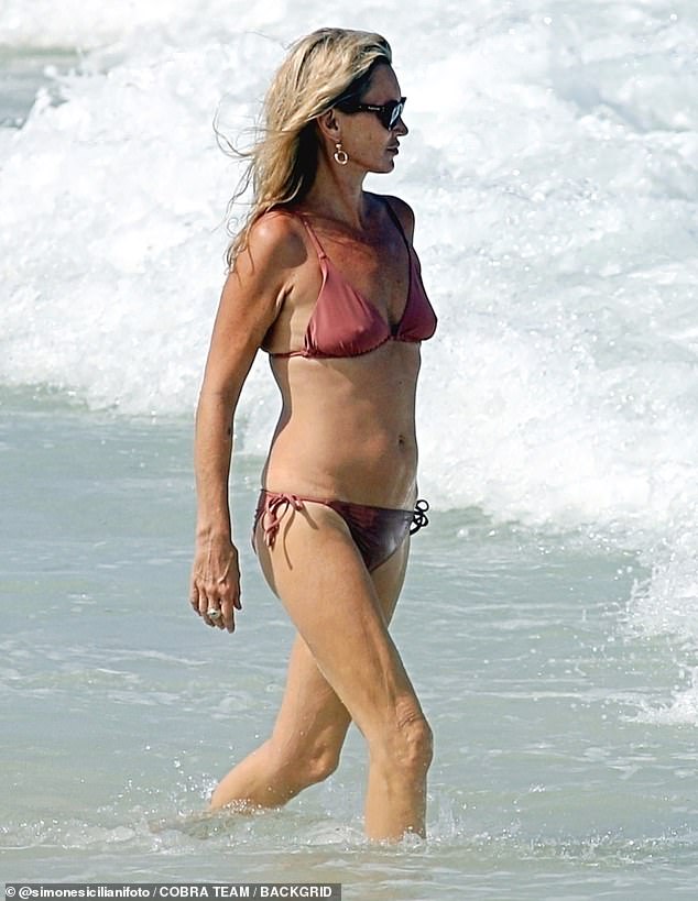 After arriving on the beach, Kate was seen heading into the ocean for a cooling swim, as she and Lila continue to enjoy their Spanish holiday together
