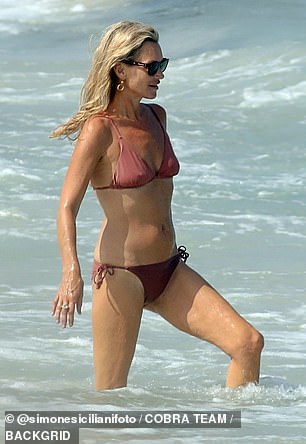 The model showed off her incredible figure in a skimpy pink bikini