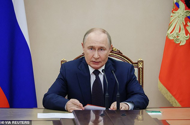 Vladimir Putin's (pictured) father gouged out his mother's eye with a pitchfork
