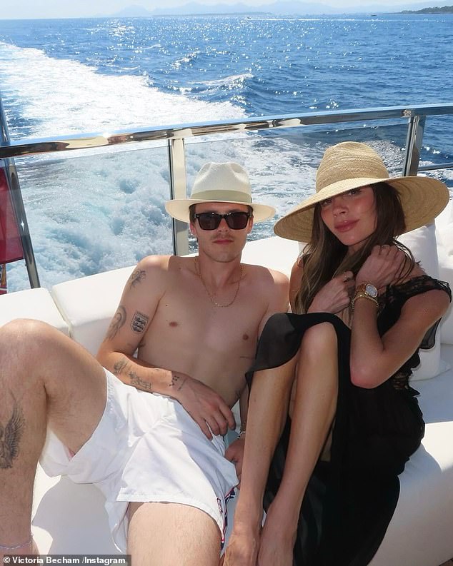 In one snap, Victoria posed with Cruz, 20, on the deck of the luxury boat while they sailed the open sea in France