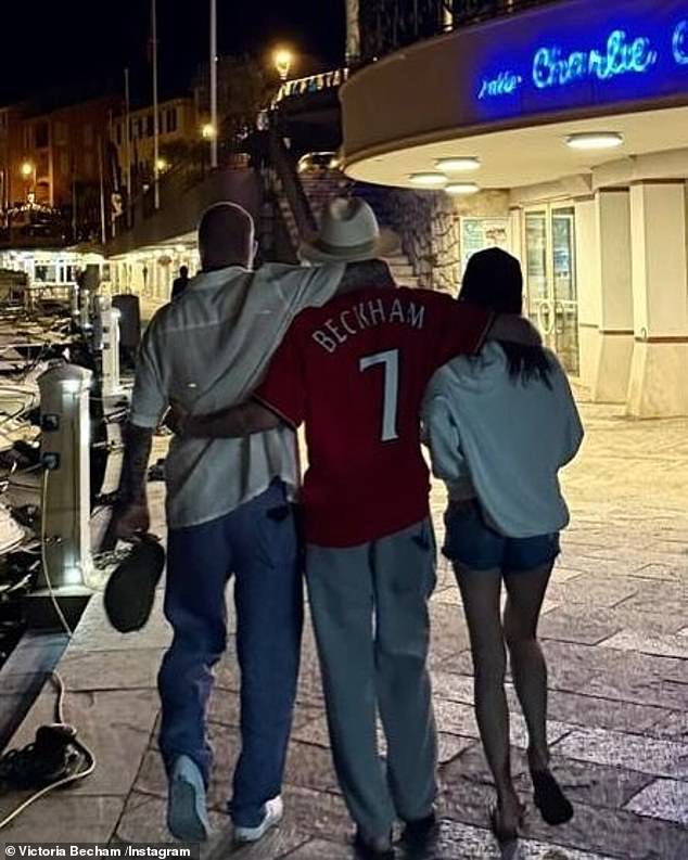 The family's close bond was clear for fans to see with Victoria capturing a candid snap of dad David walking with two of his children