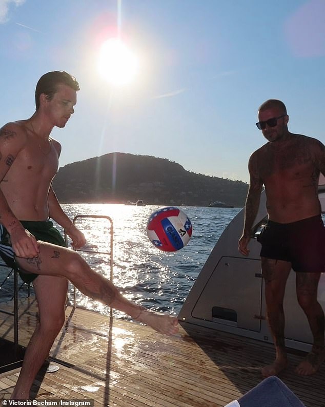 As Victoria shaded from the sun rays, Romeo, 22, Cruz and David could be seen playing a game of football on the deck of the yacht