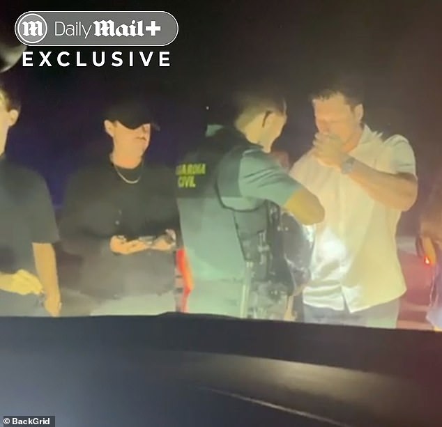 A woman, who could be Ceretti, can be heard saying, 'they are searching me full on right now', as DiCaprio - who has ditched his usual facemask - holds out the contents of his pockets to be inspected by the Spanish cops