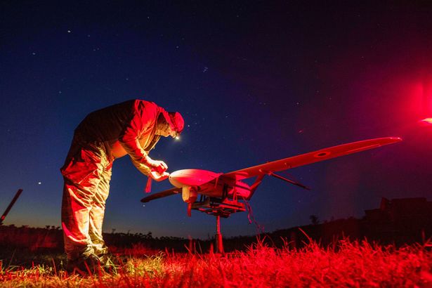 National Guardsman in Ukraine prepares drone