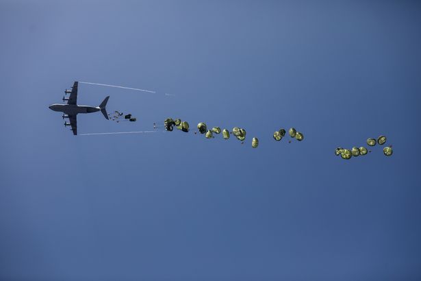 Parachutes holding vital aid drop on Gaza