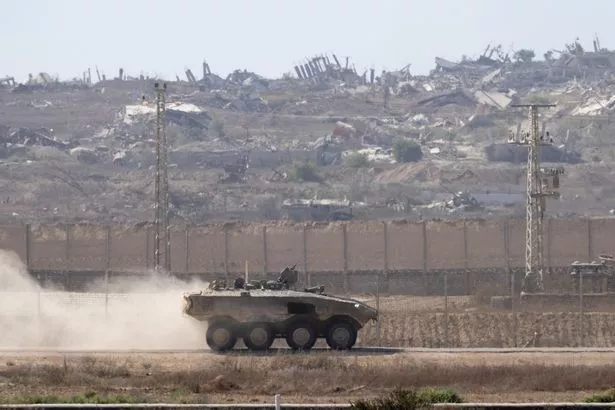 Troops move into position near Gaza border