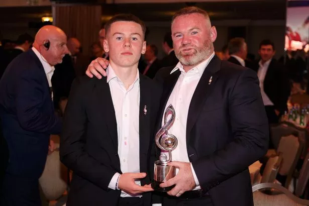 Rooney with son Kai