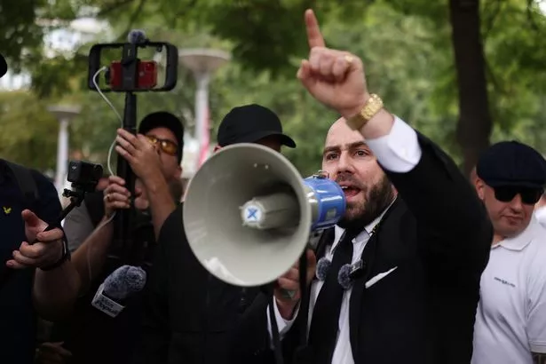 Nick Tenconi, the UKIP leader addresses the protest outside the Barbican Thistle Hotel housing migrants on August 2, 2025 in London, England