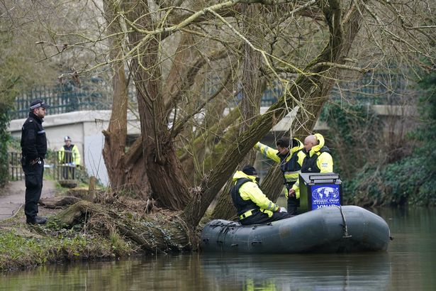 A inflatable boat launched by police in an attempt to find the boy's body