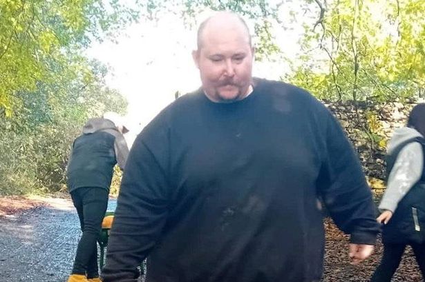 Dale Forrest before his weight loss with son Bailey