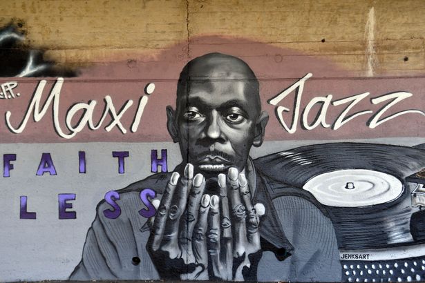 A street art mural of Maxi Jazz