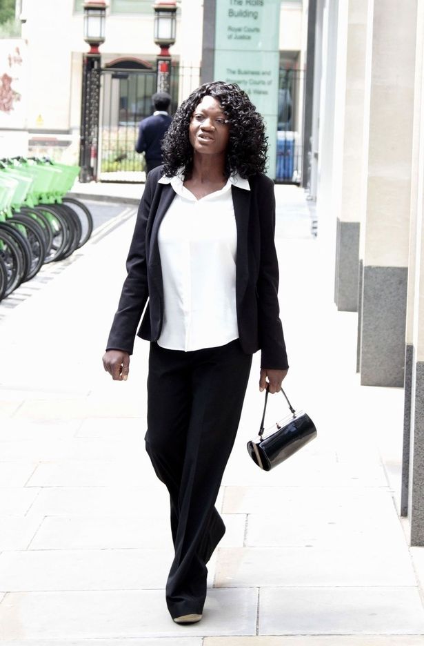 James' latest partner Margaret Dinsdale outside London's High Court