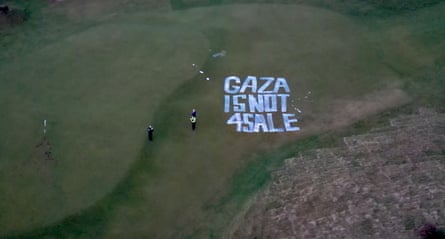 Drone view of ‘Gaza is not 4 sale’ painted on golf course