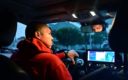 A person driving a car