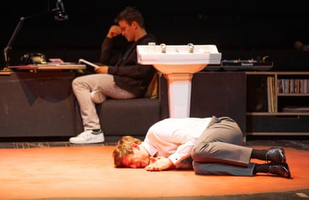 Luke Thompson (left) and James Norton (on floor) in the stage play of the novel A Little Life